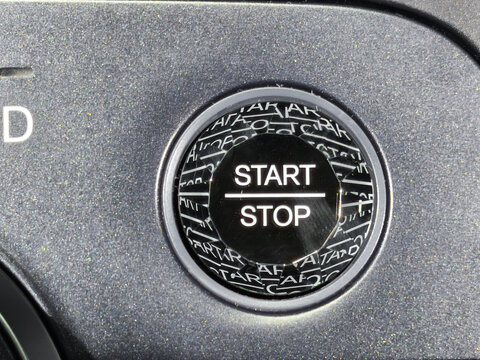Modern Engine Start Stop Button on Luxury Car Dashboard Console