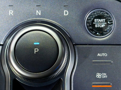 Modern Rotary Car Gear Shifter and Selector on Console