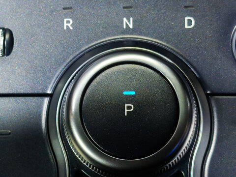 Modern Rotary Car Gear Shifter and Selector on Console