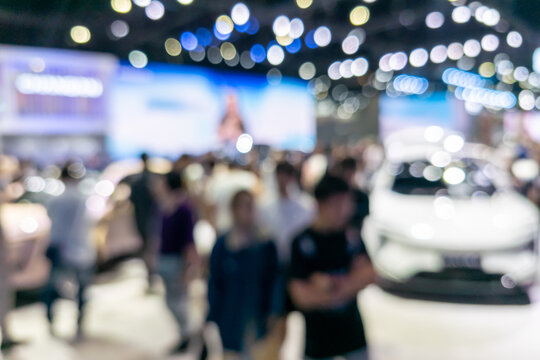 Blurred Background of Luxury Car Exhibition with Vibrant Bokeh