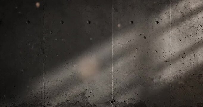 Abstract Grey Concrete Wall Background with Sun Light and Dust Particles