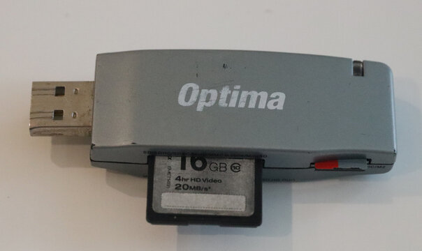 Norwich, England, April 4 2026: Editorial photo. Compact usb adapter connecting memory card to computer for data transfer and storage solutions