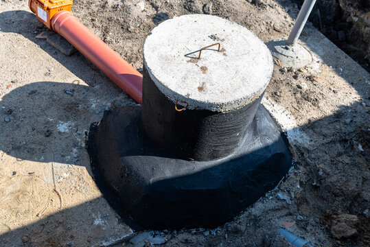 Septic tank concrete manhole waterproofing with bituminous insulation