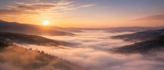 Fototapeta premium Minimal cinematic landscape of a foggy valley at sunrise, with soft golden light and layered mountains creating a calm atmosphere and large copy space for commercial use 02