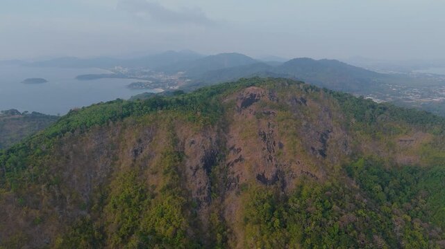 Majestic mountains Black Rock top with green and golden brown foliage stretch under a clear blue sky