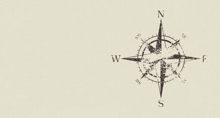Vintage compass rose with grunge texture on neutral background representing navigation © natrot