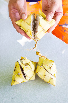 Freshly cooked Filipino puso rice, wrapped in coconut leaves. Puso, or hanging rice, is a traditional Filipino delicacy from Cebu and the Visayas region