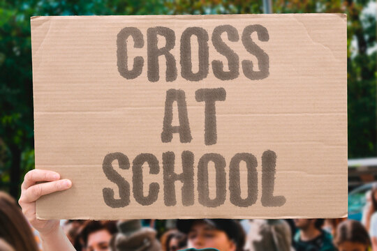 "Cross At School" Students wearing religious symbols at school test the boundaries of secular public education. GOD. SCHOOL. RELIGION. SYMBOLS. SECULAR.