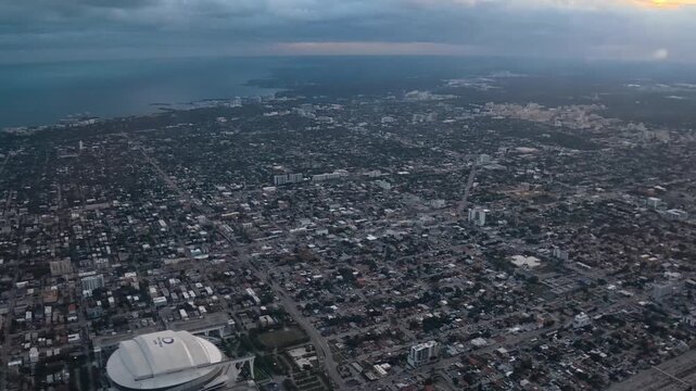 Aerial Transit: 4K Airplane Window View Over Miami&rsquo;s Riverside Neighborhood and Miami River