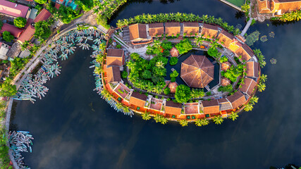 Aerial view of Sampan rowing boat mooring in Ninh Binh, Vietnam. © tawatchai1990