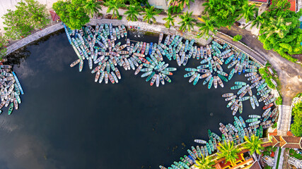 Aerial view of Sampan rowing boat mooring in Ninh Binh, Vietnam. © tawatchai1990