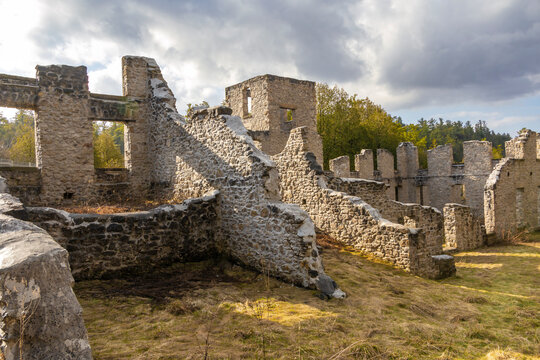 The historic Harris Woollen Mill ruins, located in Ontario's scenic Rockwood Conservation Area, showcasing architectural remnants from the 19th century amid lush surroundings.