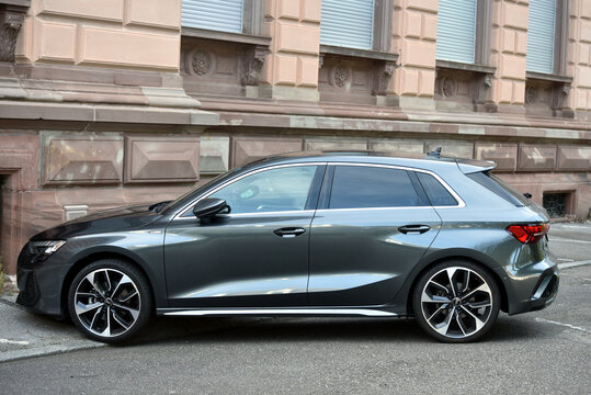Mulhouse - France - 5 April 2026 - profile view of grey audi A3 parked in the street	