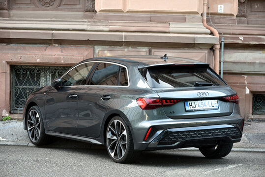 Mulhouse - France - 5 April 2026 - rear view of grey audi A3 parked in the street	