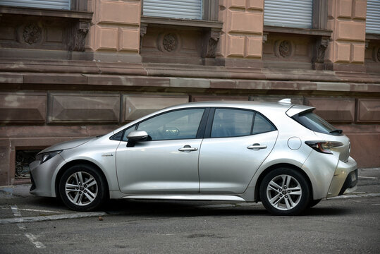 Mulhouse - France - 5 April 2026 - profile view of toyota corolla parked in the street