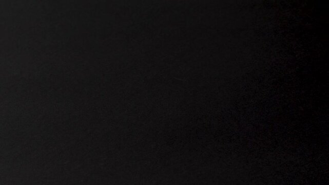 Cezve_replacing_hand_moving_black_background_mockup_slow_motion_copy_space