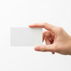 Obraz premium A hand pinching a small object between the thumb and index finger