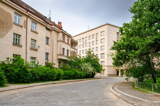 uzhhorod, ukraine - 03 jun 2012: urban scenery in summertime. view from hoidy street near park of st. tetyany with paved walkways. location near narodna square. cobbled street of uzhgorod city