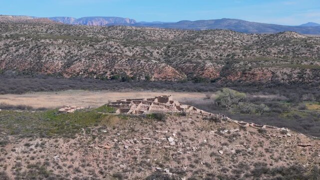 Tuzigoot Ruin National Monument near Jerome AZ Camera arcs around hill top stone ruin