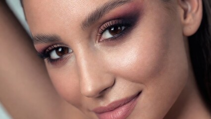 Fototapeta premium Glossy lips curl into a soft, inviting smile