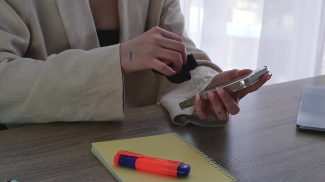 Disinfecting personal items with antibacterial wipes.
Disinfecting your phone from viruses and germs.
A way to protect yourself from harmful bacteria in the office.