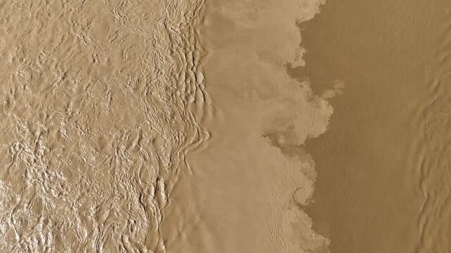 Abstract aerial texture of muddy river currents and sediment dynamics