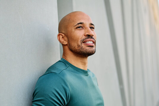 Portrait opf a young man prepering to exercise in sportwear posing for a portrait