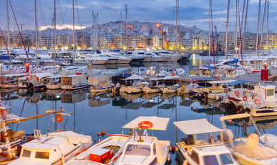 Marina Zeas at blue hour in Piraeus, Greece with yachts © pillerss