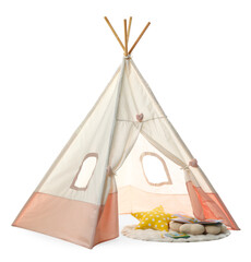 Stylish wigwam for child's room with books and pillows isolated on white © New Africa