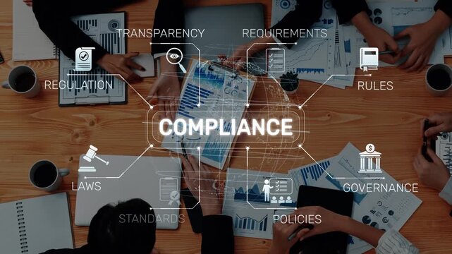 Engaging top-down view of professionals in a collaborative meeting focusing on compliance, governance, and regulatory requirements through data analysis and strategic planning. Raster