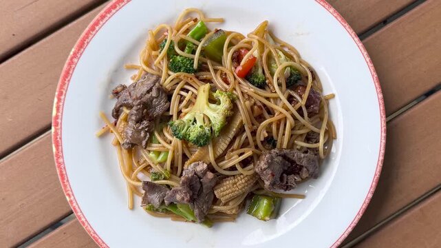 Rotating Plate of Spicy Beef Noodles