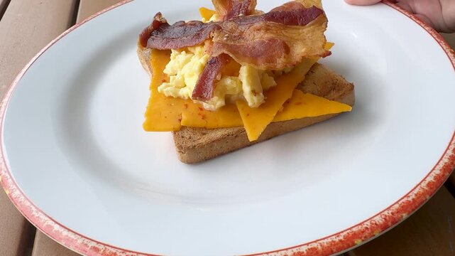 Serving a Bacon, Egg and Cheese on Toast