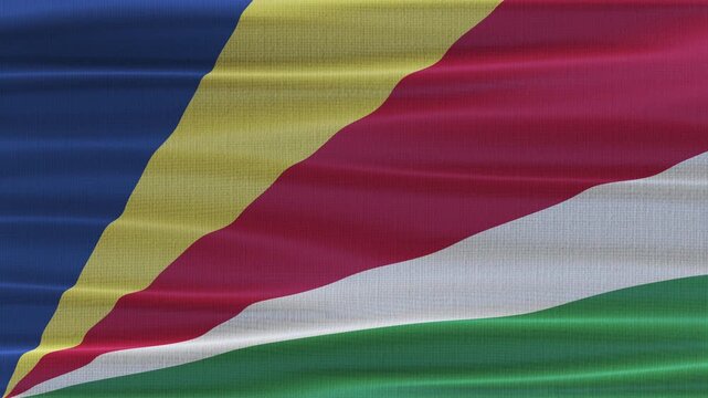 Seychelles flag waving in the wind with high quality fabric texture