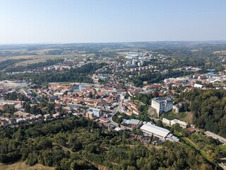 Fototapeta premium Aerial panorama of Velke Mezirici Castle in the Vysocina region,castle complex, showing historic architecture and surrounding town landscape from above