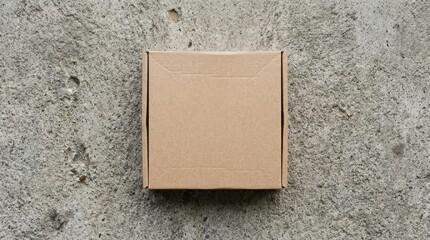 Fototapeta premium Minimal cardboard packaging box mockup top view flat lay