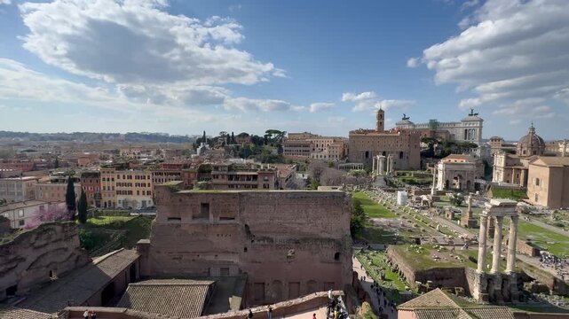 Scenic aerial panoramic Rome cityscape with the Forum in the foreground viewed from the Palatine Hill, Italy