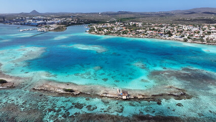 Caribbean Skyline In Oranjestad Caribbean Netherlands Aruba. Tourists Enjoying A Sunny Day At A Caribbean Sea. Shore Clouds Sky Beach Sea. Shore Travel. Oranjestad Caribbean Netherlands. © bydronevideos
