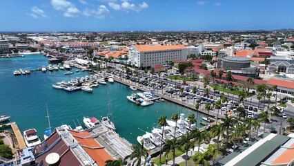 Obraz premium Aruba Skyline In Oranjestad Caribbean Netherlands Aruba. Aerial View Of A High(Rise Buildings And Traffic Showcasing Urban Life. Business Sky Downtown Cityscape. Business Backgrounds Panorama.