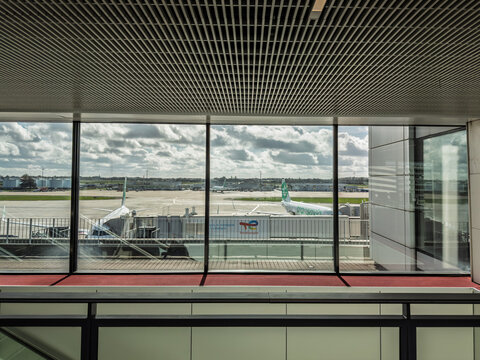 PARIS, FRANCE - MARCH 1, 2026: Transavia Planes seen through terminal windows at Paris Orly Airport, with apron activity and airport infrastructure. Aeroport d'orly is one of paris airports.