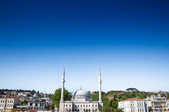 View of Beylerbeyi Mosque in Istanbul, Turkey, also known as Hamid I Evvel Camii, showing its central dome and twin minarets rising above the waterfront district of Uskudar.