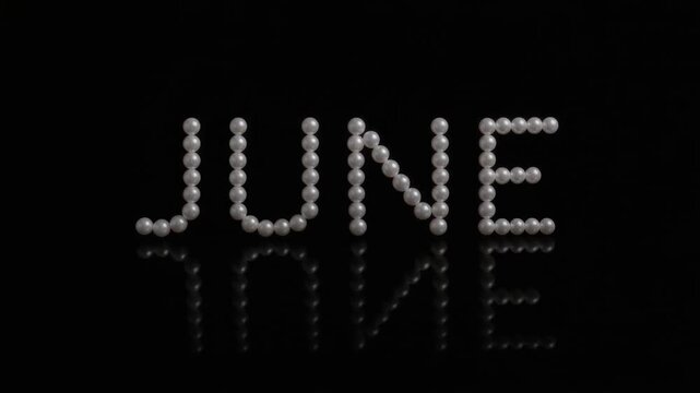 パール誕生石6月立体ロゴ黒背景