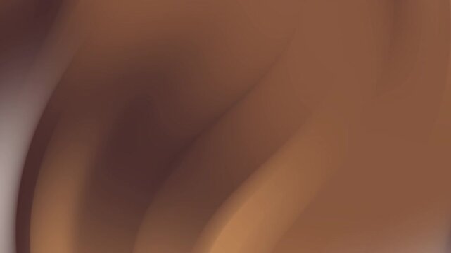 Abstract blurry brown and tan hues blend together in a dreamy, ambiguous composition, ideal for backgrounds or artistic concepts.