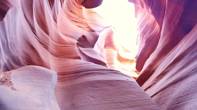 Flowing sandstone curves and vibrant layered patterns inside the narrow slot of Lower Antelope Canyon