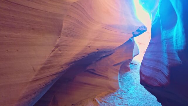 Flowing sandstone curves and vibrant layered patterns inside the narrow slot of Lower Antelope Canyon