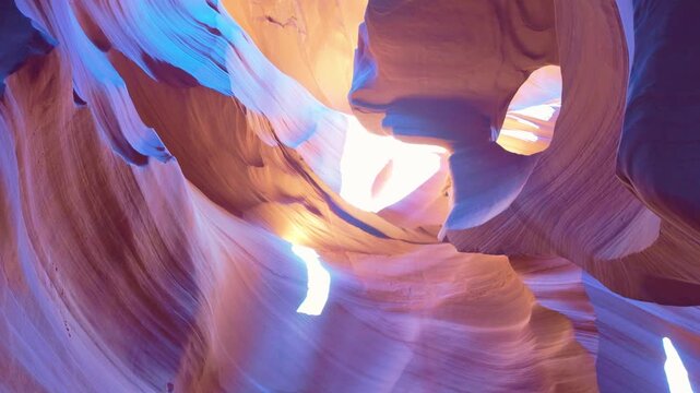 Flowing sandstone curves and vibrant layered patterns inside the narrow slot of Lower Antelope Canyon