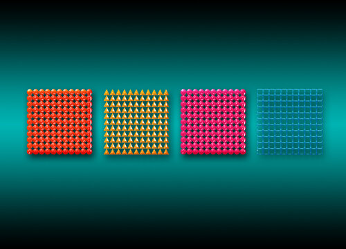 Four squares made of colorful beads on teal background