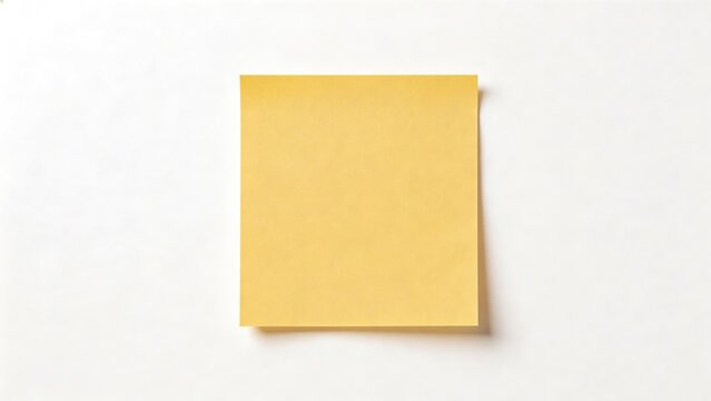 Yellow sticky note on white surface