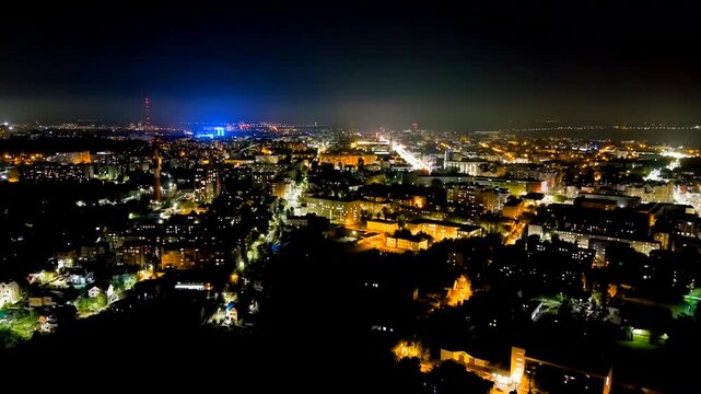 Kaluga, Russia. Panorama of the night city. Night flight over the city. Drone footage