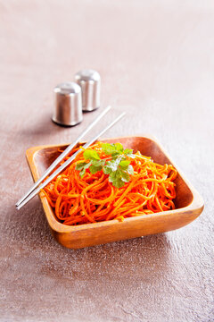 Carrot salad. French Grated Carrot Salad. Shredded carrot with garlic and black pepper