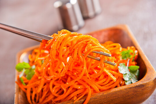 Carrot salad. French Grated Carrot Salad. Shredded carrot with garlic and black pepper
